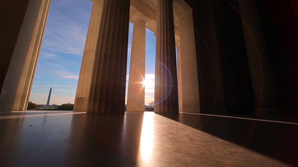 Sunlight between stone columns
